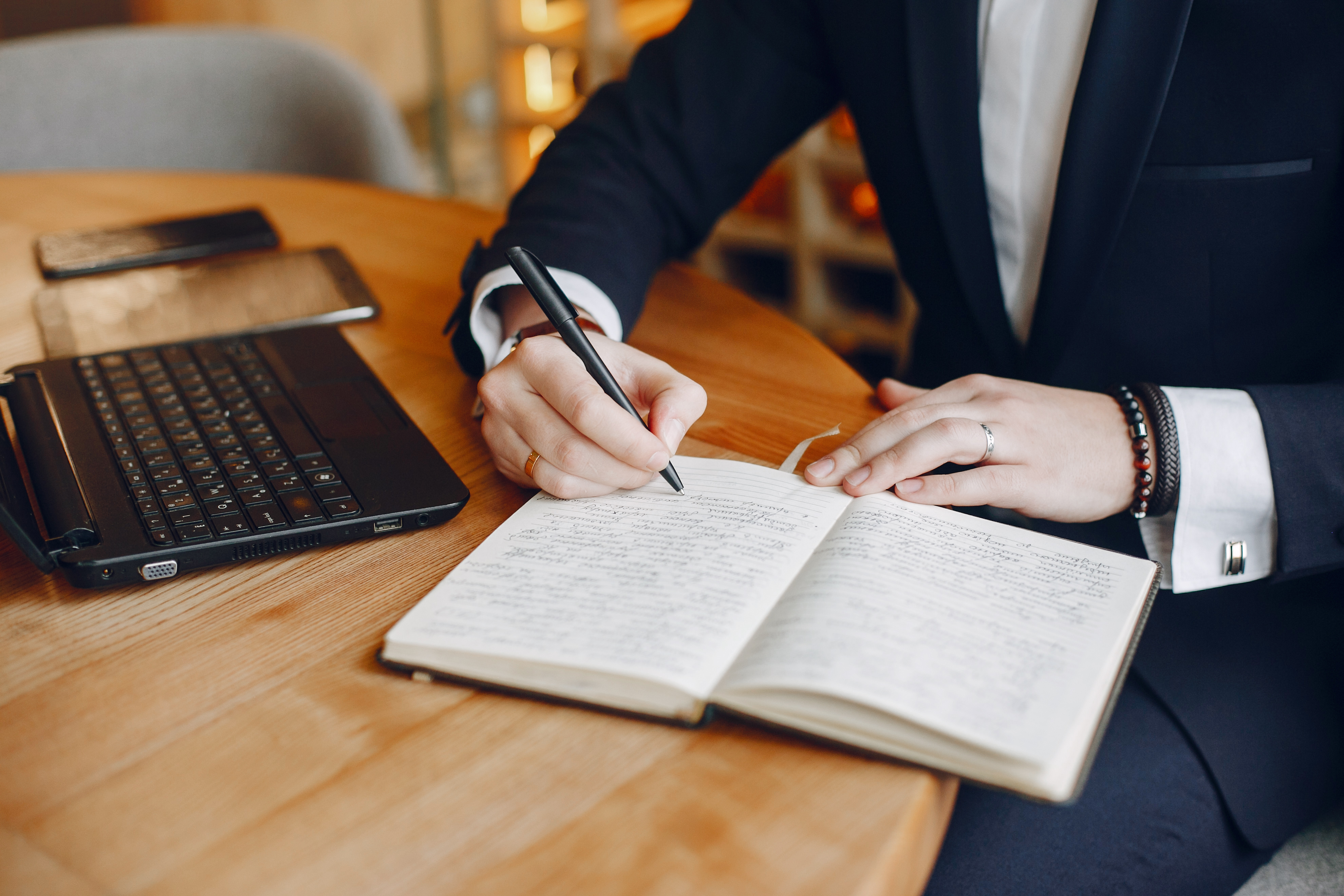 Lawyer reviewing legal research notes on laptop